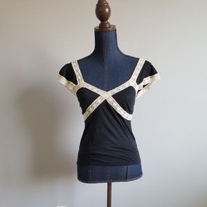 The limited lace trimmed top